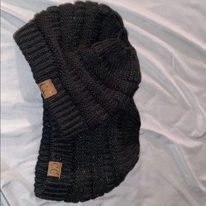 Two black C.C beanies